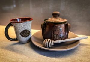 a coffee cup and saucer sitting on a plate